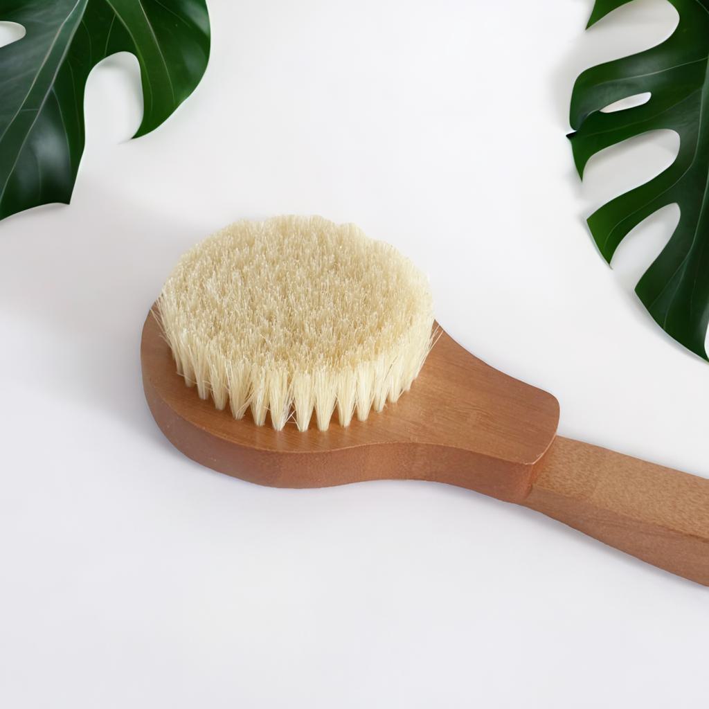 Seven 8ths Invigorate Brush made of wood and natural-bristles for dry brushing and whole-body exfoliation