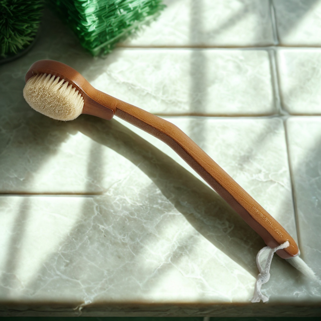 Seven 8ths Invigorate Brush made of wood and natural-bristles for dry brushing and whole-body exfoliation